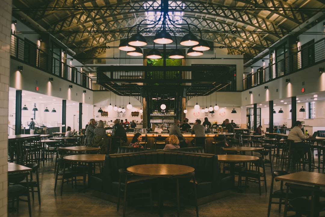 why-choose-us a-restaurant-filled-with-lots-of-tables-and-chairs-ylsjyd1cqhe